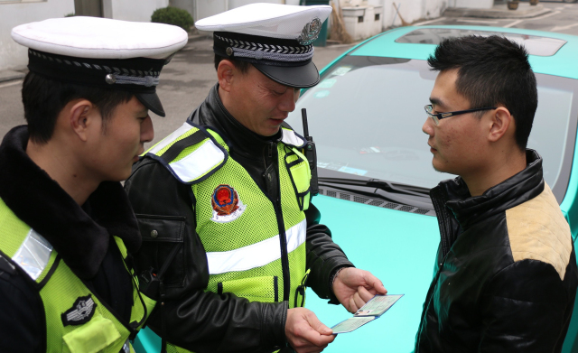 新交规重拳出击 2.5亿卖分黄牛即将下岗