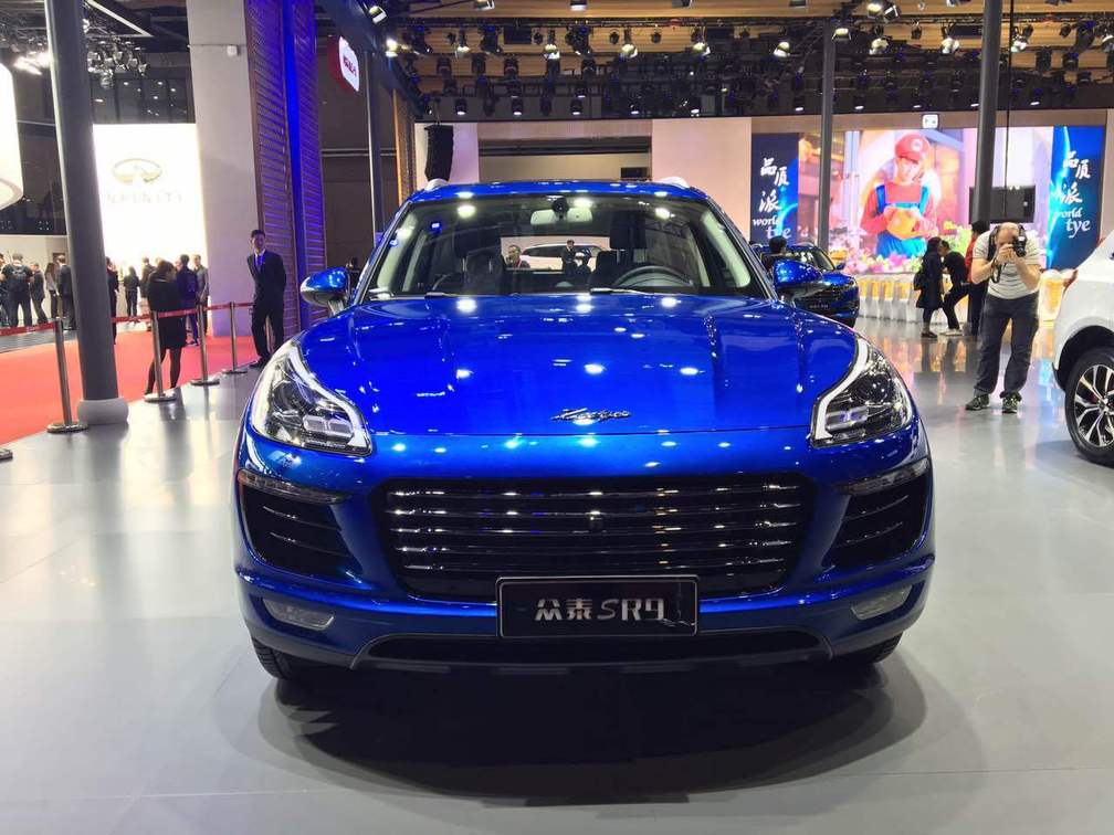 外观方面,众泰sr9极致之巅采用潮流动感的轿跑式suv造型,"鲨鱼式"前脸