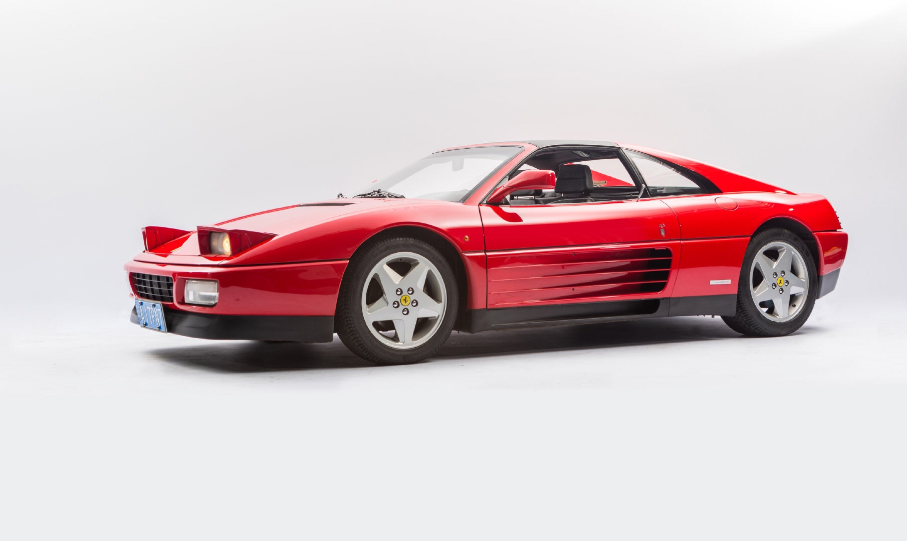 不同于暴躁炸街的法拉利这辆优雅绅士348ts同样叙说着属于它的红色